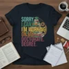 Sorry I Can't I'm Working On My Doctorate. Degree. text with stack of books and graduation cap graphic on navy