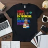 Sorry I Can't I'm Working On My Doctorate T-Shirt featuring an owl on books with science graphics and rainbow text