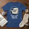 Sorry I can't, my cat needs me text with a sleeping cat graphic on a navy blue t-shirt