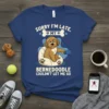 Sorry I'm Late My Bernedoodle Couldn't Let Me Go text with cute Bernedoodle dog graphic on a navy blue t-shirt