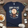 Navy blue t-shirt with "SORRY I'M LATE PAST DUE (I was dilly dallying)" text and a graphic of a clock