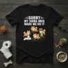 Sorry My Shiba Inus Made Me Do It text with cartoon Shiba Inus playing with toilet paper and a plant