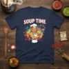 Soup Time T-Shirt featuring a buff cartoon cat chef with red eyes holding a ladle, surrounded by colorful splashes