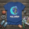 Space Jammers Intergalactic Hoops t-shirt design featuring a green alien playing basketball with a moon and nebula background