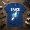 Blue t-shirt with the word SPACE in white and a graphic of a rocket launching into outer space with planets