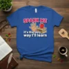 T-shirt with the quote "SPANK ME it's the only way I'll learn", featuring a hand, books, and an apple graphic