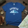 Spencer Mountains T-Shirt with blue mountain graphic and compass, ideal for adventure lovers