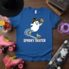Spooky Skater t-shirt design with a cute ghost wearing a witch hat and holding a flower, on roller skates