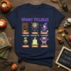 Spooky Syllables Halloween t-shirt design with cat, candy, witch, zombie, candle, and monster graphics and text