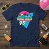 Spring Break 95' retro graphic t-shirt with palm trees and a sunset, evoking 90s summer vacation nostalgia