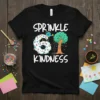 Sprinkle Kindness 6th birthday t-shirt with a donut number 6 and a watering can pouring hearts onto a tree