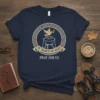 Navy t-shirt featuring a circular design with a dove and olive branch, honoring St. Francis of Assisi with the text