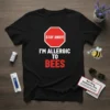 T-shirt with "STAY AWAY! I'M ALLERGIC TO BEES" text and a stop sign graphic. Includes bee allergy warning