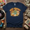 Stay Groovy text with a teal peace sign, mushrooms, flowers, and music notes on a navy blue t-shirt