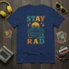 Stay Rad t-shirt design with retro city skyline, lightning bolts, and a classic car graphic