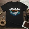 Stellar Sea Lion t-shirt design featuring a grey sea lion swimming through stylized blue and white waves with "STELLAR SEA