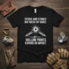 Black t-shirt with white text reading "Sticks and Stones May Break My Bones But Hollow Points Expand on Impact" and
