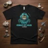 Black t-shirt featuring a cat in a vintage diving helmet with "Stingray City Grand Cayman" text
