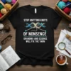 Black t-shirt with white text "STOP KNITTING KNOTS OF NONSENSE GRANDMA AND SCIENCE WILL FIX THE YARN" and a graphic