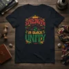 Strength in Black Unity text with raised fist graphics and crown on black t-shirt design