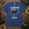 Stubborn As A Mule T-Shirt featuring a black donkey graphic and white distressed text