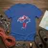 Blue t-shirt with red "SUISSE" text above a graphic of a mountain climber ascending a peak, with Swiss flag colors