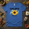 Sunflower Himawari text with a central sunflower graphic and wavy blue lines on a royal blue t-shirt