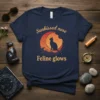 Sunkissed nose Feline glows text with silhouette of cat sitting on moon graphic
