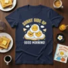 Sunny Side Up Good Morning t-shirt with a cute illustration of three smiling fried eggs stacked on a plate