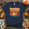 Sunshine State of Mind retro design with a sunset, palm trees, and ocean waves on a navy t-shirt