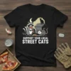 Support Your Local Street Cats t-shirt with raccoon and opossum graphic feeding stray cats