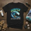 Surfer riding a wave with the text "SURFER OCEAN ALWAYS CHASING THE PERFECT SWELL" on a black t-shirt
