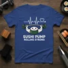 Sushi Pump Rolling Strong t-shirt design with a sushi roll lifting weights, heartbeat line, and text