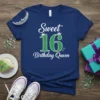 Sweet 16 Birthday Queen text design with glittery green number 16 and crowns on a navy t-shirt