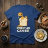 Sweet As Can Be! honey toast t-shirt with dripping honey and a crown, on a blue shirt