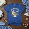 Sweet Dreams Little One t-shirt with a cute bear sleeping on the moon, stars, and clouds, in a circular design
