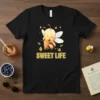 Sweet Life t-shirt design with a cute bee holding an ice cream cone and the text SWEET LIFE