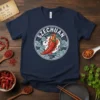 Szechuan text and fiery chili pepper graphic on a navy t-shirt, representing spicy Chinese cuisine