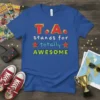 T.A. stands for totally AWESOME text design on a blue t-shirt, featuring bold red letters for T.A., white text for