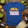 Blue t-shirt with the word "TACOS" in large white letters and three cartoon tacos above it