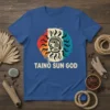 Taino Sun God t-shirt featuring a circular graphic of a stylized sun face with radiating lines in red, orange, and