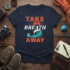 Take Breath Away t-shirt with mountain peak and ocean wave graphic in orange and teal colors