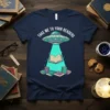 Take Me To Your Readers UFO T-Shirt design featuring a flying saucer beaming up a book, surrounded by other books