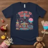 Take Me To The Fair T-Shirt featuring a colorful amusement park scene with a carousel, roller coaster, and fireworks