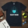 Talent Inside T-Shirt featuring a silhouette with a geometric heart graphic and bright rays, text in white