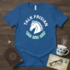 White text "Talk Frisian" above a white Friesian horse head with green Celtic knot design on a blue t-shirt