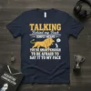 Navy t-shirt with bold yellow and white text: TALKING Behind my Back SIMPLY MEANS YOU'RE SMART ENOUGH TO BE AFRAID