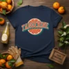 Navy t-shirt with "TANGERINE" text in a retro font over a graphic of a tangerine slice
