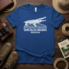 White graphic of an alligator on Tarcoles Bridge Costa Rica text on a blue t-shirt