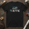 Black t-shirt featuring the word "TARIFFic" in colorful blocks, with a shipping ship and crane graphic above, symbolizing global trade